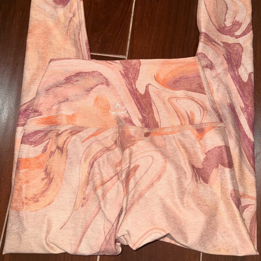Beyond Yoga Swirl Patterned Leggings in Pink and Orange